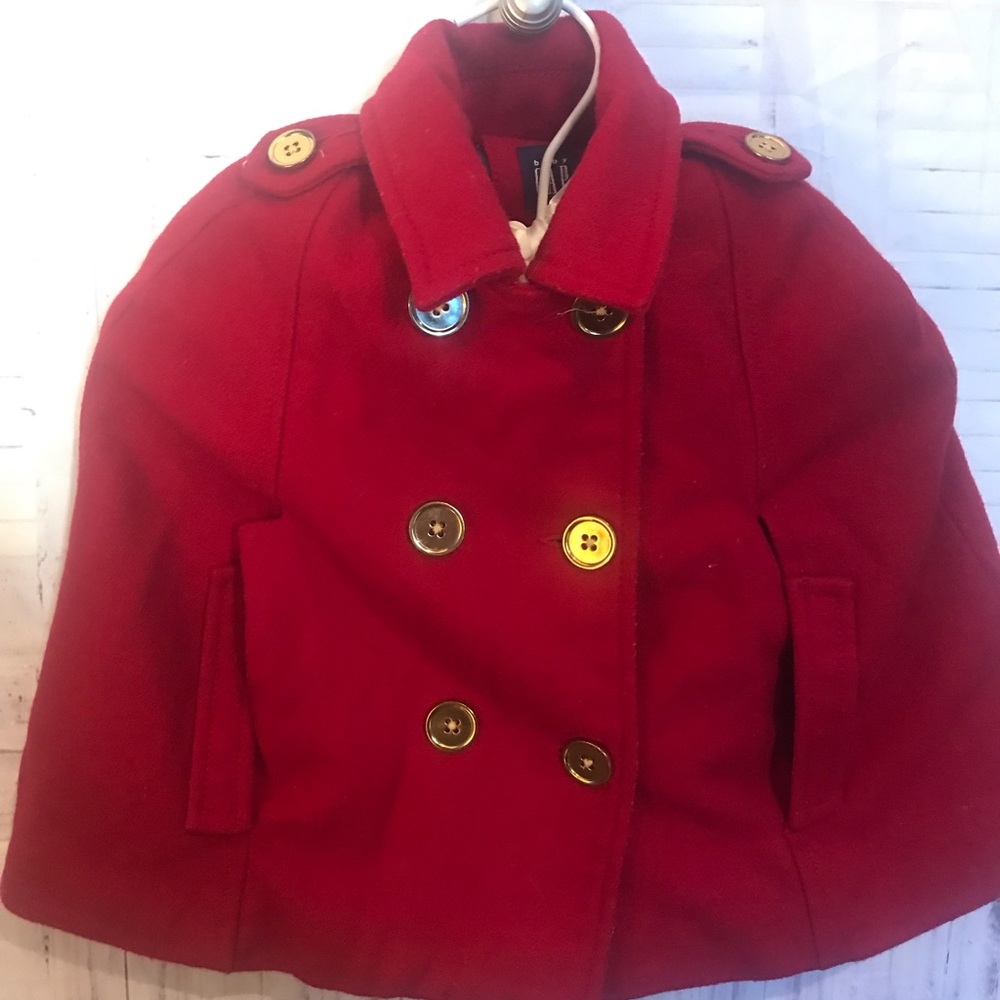 Red gap poncho and matching bowler hat